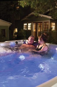 Caldera-Paradise-Martinique-2015-White-Pearl-Lifestyle-Couple-Night-01 1 | Young's Hot Tub Sales and Service Center