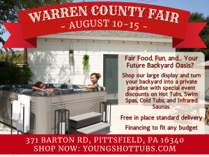 Backyard scene with a hot tub and two people; a large red curved banner across the top reads 'WARREN COUNTY FAIR - AUGUST 10-15 -' with promotional text panels overlaid on the right side.